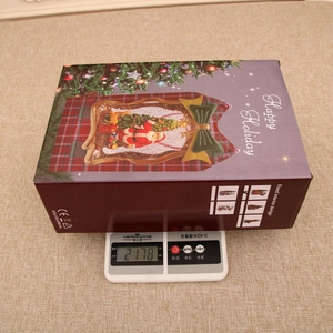 Detailed gift box dimensions 203x105x296mm and 2178g weight measurement for the music box