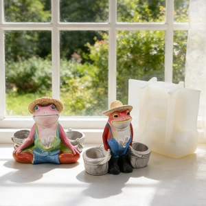 Silicone mold for resin frog figurine with sample hand-painted garden decorations