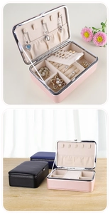Detail of PU leather jewelry box with necklace hooks, ring slots and velvet lining