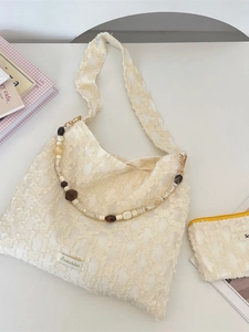 Off-white lace tote bag with floral pattern and vintage beaded strap for women