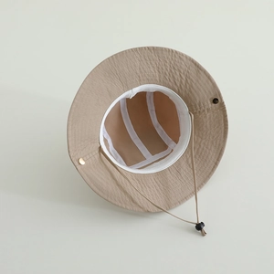 Detail of khaki kid fisherman hat showing inner sweatband, structure and windproof rope