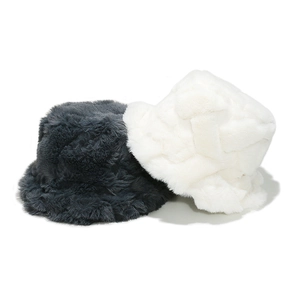 Detail of dark grey and cream faux fur bucket hats with thick textured knit for winter