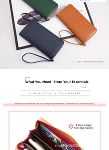 Detail view of crocodile pattern long wallet with zipper closure and wrist strap