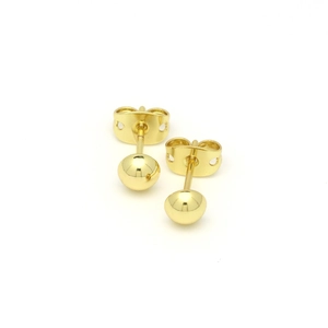 Detailed macro view of 18k gold plated ball stud earrings with butterfly back fasteners