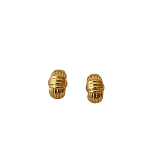 Minimalist gold-plated brass stud earrings with vintage striped texture on white background