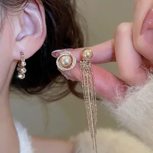 French vintage style round pearl earrings with golden chain tassels and zircon studs