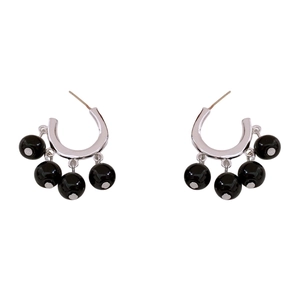 Vintage silver-tone hoop earrings with black bead pendants for a stylish ethnic look