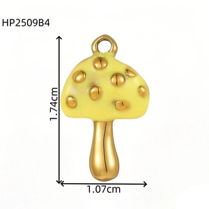 Detailed view of yellow mushroom pendant with gold dots and 1.74cm height dimensions