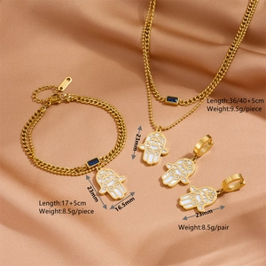 Golden stainless steel Hamsa Hand jewelry set with necklace, bracelet and earrings