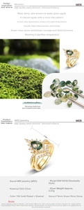 Detail view of S925 silver ring with 6x8mm oval moss agate and gold plating