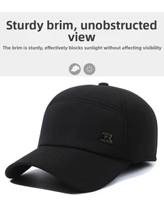 Close-up of a men's winter baseball cap with a metal 'R' logo and structured visor
