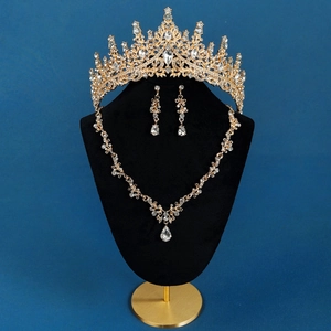 Detail view of luxury bridal tiara, necklace and earrings set with crystal droplets