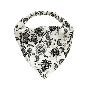 Fascia elastica a triangolo con motivi floreali neri su tessuto bianco per donna