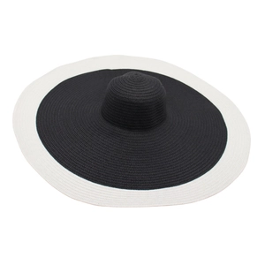 Large brim straw sun hat with black and white contrast design for beach vacation