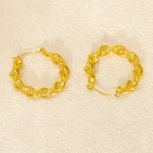Créoles torsadées en acier inoxydable plaqué or 18 carats avec zircons cristallins
