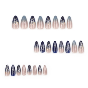 Starry sky almond press-on nails with navy blue gradient and gold star glitter