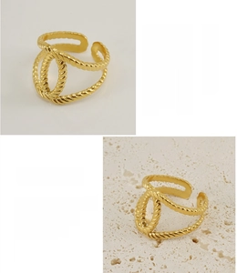Detail of 18K gold plated stainless steel intertwined rope ring with adjustable opening