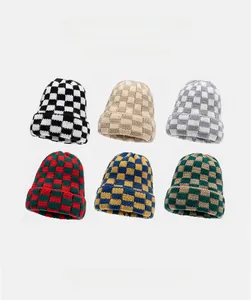 Detailed grid view of chunky knit checkerboard hats in six diverse color combinations