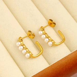 Elegant U-shaped gold stainless steel stud earrings with four round white pearls for women