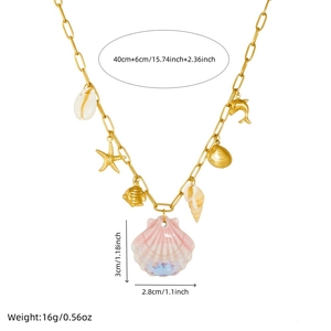 Gold ocean necklace with pink gradient scallop and starfish charms showing dimensions