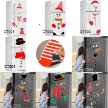 Detail view of various Christmas snowman magnetic PVC decals for vehicle and home decor
