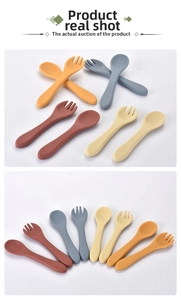 Close-up of food-grade silicone baby spoons and forks in soft Morandi colors for feeding