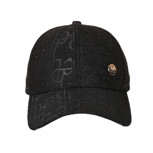 Fashionable black baseball cap with sparkling fabric and a gold metal logo detail
