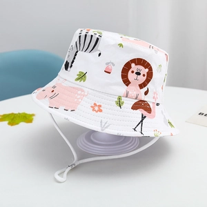 Detail of white cotton kids sun hat with colorful cartoon animal prints and chin strap
