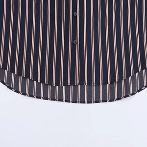 Vertical striped shirt in navy blue and red with a curved hem and button details