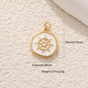Detail showing dimensions of the gold ship wheel pendant with white oil drip finish