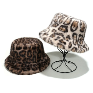 Faux mink leopard print bucket hats in deep brown and beige colors for winter warmth