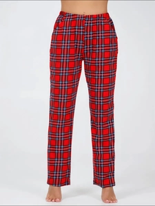 Detail of red and blue plaid pajama pants featuring an elastic waist and straight fit