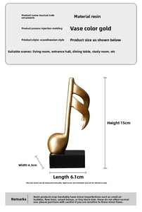 Detailed view of gold resin music note ornament with precise dimensions and black base