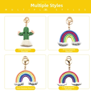 Detail of handmade cotton woven rainbow and cactus keychain set with metallic hardware