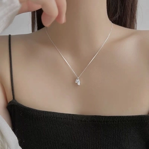 Elegant S925 sterling silver necklace featuring leaf pendants on a fine chain for women