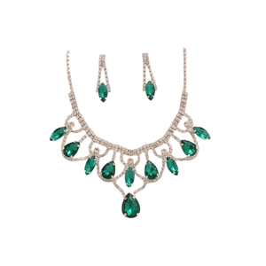 Elegant silver necklace and drop earring set with green teardrop stones on white base