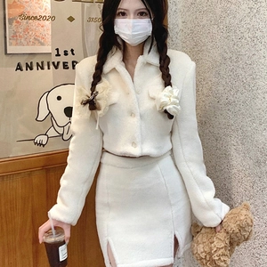 White fleece two-piece set featuring a cropped plush jacket and slit mini skirt for women