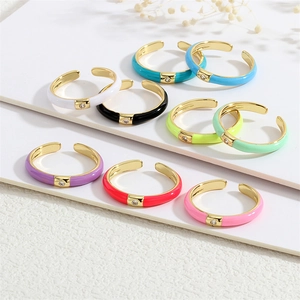 Stack of 9 18K gold plated colorful enamel open rings with sparkling zircon inlay