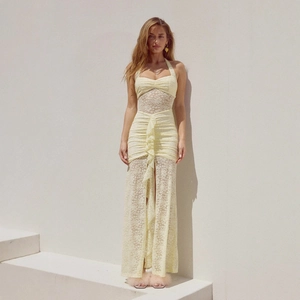 Pale yellow lace maxi dress with halter neck and ruffle detail for elegant summer style