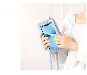 Detail showing a light blue leather touch screen phone bag with a transparent front window