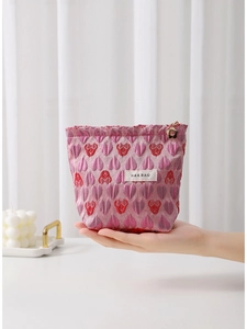 Pink heart patterned canvas makeup bag with H&R BAG label and floral zipper pull
