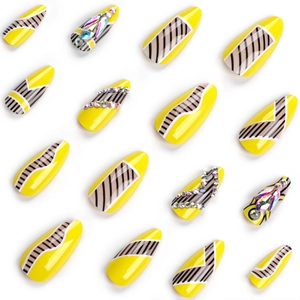 Creative abstract press-on nails with yellow and black geometric patterns and rhinestones