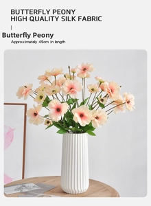 Detailed view of pink ranunculus silk flowers in a white vase, height 49cm
