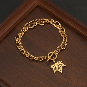 Gold layered stainless steel necklace with maple leaf pendant and T-bar toggle clasp
