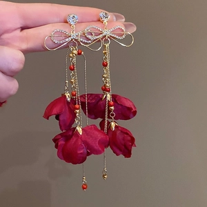 Elegant gold drop earrings with rhinestone bows, red beads and silk rose petals