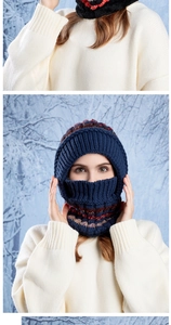 Detail of navy knit balaclava with ethnic pattern and warm fleece lining for winter protection