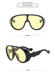 Detailed front and side views of oversized black frame sunglasses with yellow lenses