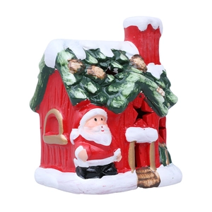 Ceramic Christmas house figurine with Santa Claus relief and colorful LED decoration
