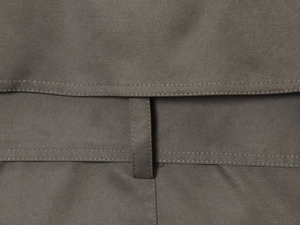 Macro shot of high-density twill fabric belt loop with precise reinforced stitching