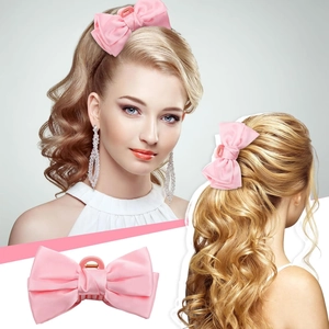 Pink satin bow hair claw clip for women's half-up hairstyles with elegant fabric finish